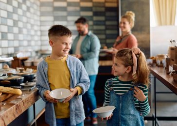 happy-kid-and-his-sister-enjoying-in-buffet-breakf-2024-03-12-22-42-45-utc-1.jpg