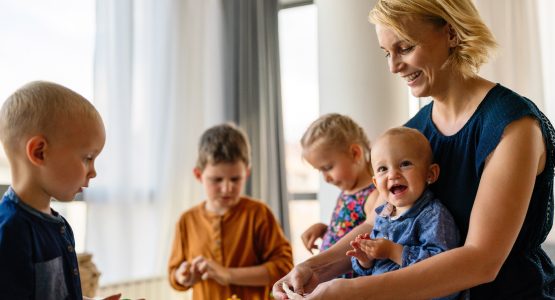 mother-or-nursery-teacher-teaches-her-children-to-2023-11-27-05-24-43-utc-1.jpg