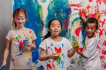 portrait-of-happy-kids-with-finger-colours-and-pai-2023-11-27-04-54-32-utc-2.jpg
