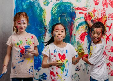 portrait-of-happy-kids-with-finger-colours-and-pai-2023-11-27-04-54-32-utc-2.jpg